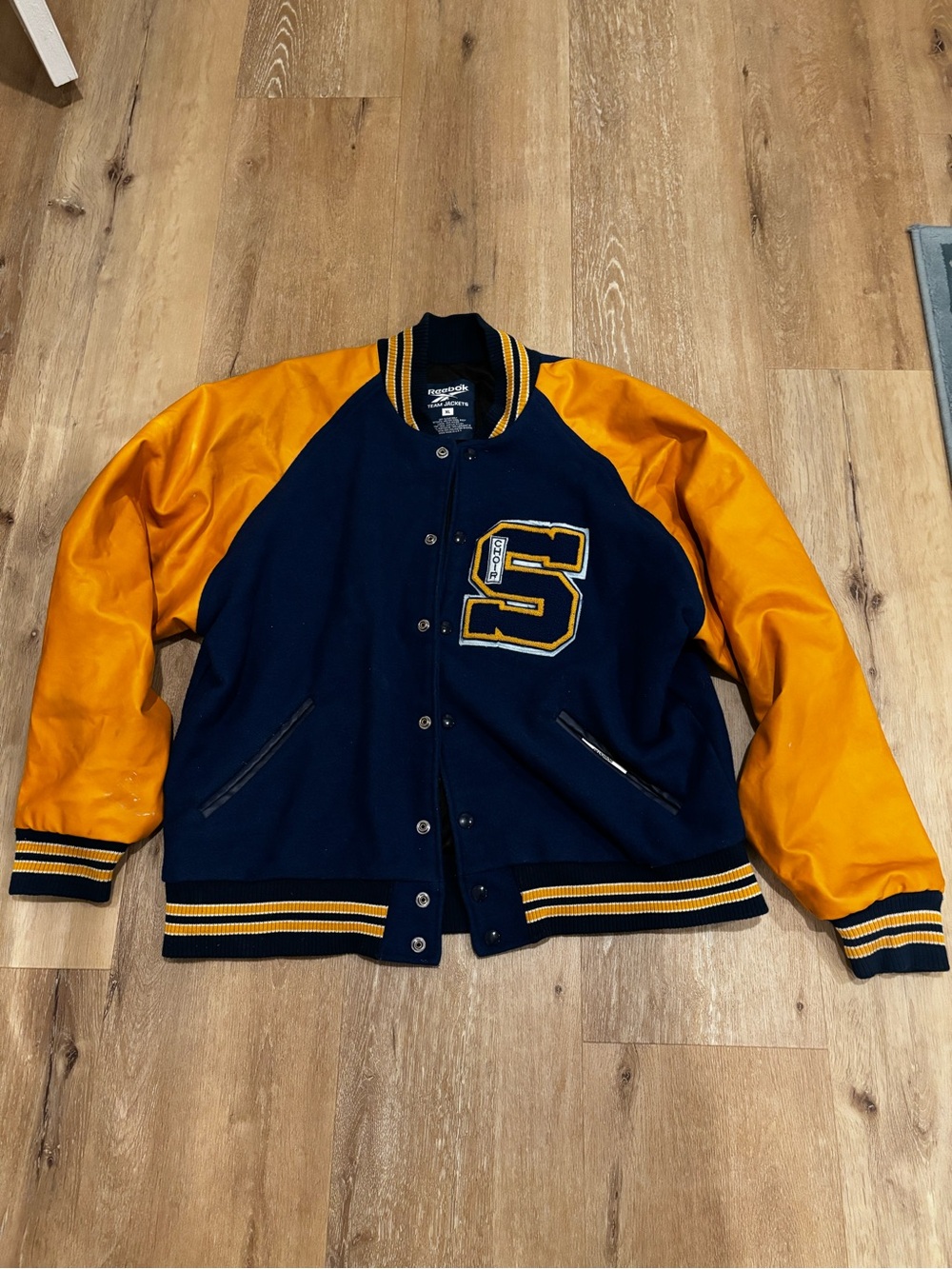 Reebok Navy and Gold Varsity Bomber 90โs Jacket